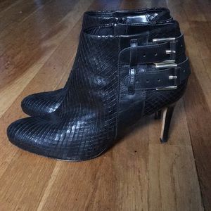 Ann Taylor black snakeskin buckle booties